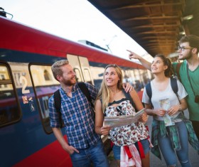 Happy tourists at the train station HD picture 01