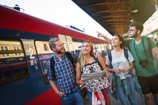 Happy tourists at the train station HD picture 01