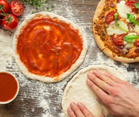 Homemade delicious pizzas with tomato sauce Stock Photo