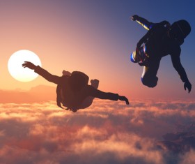 Limit skydiving with the fiery red sun Stock Photo