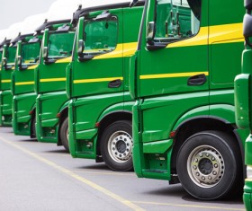 Neatly arranged delivery trucks HD picture