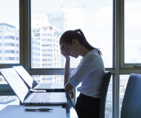 Notebook and close your eyes with the girl Stock Photo