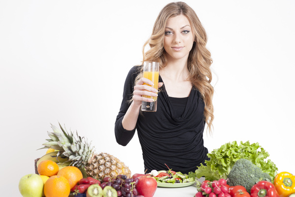 Nutrition Healthy woman with vegetables and vegetable juice in hand 02
