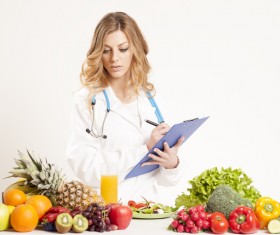 Nutritionist with fresh vegetables and fruits HD picture 01