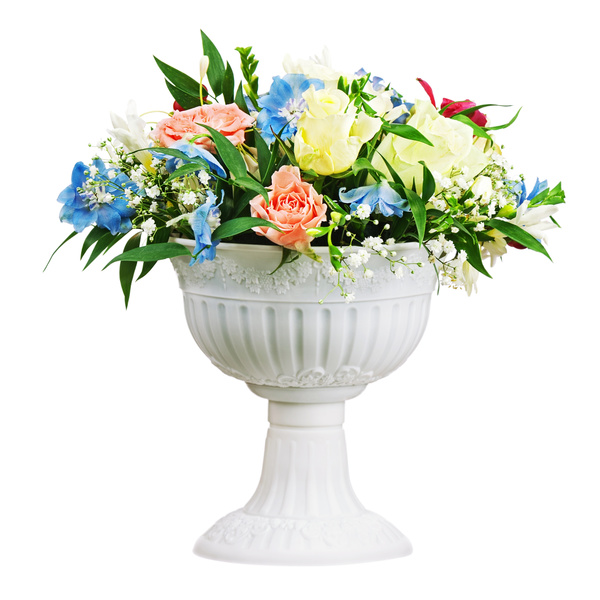 Porcelain flower pot with colorful flowers Stock Photo