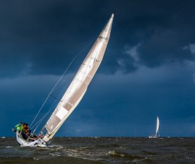 Severe weather sailing in the sea Stock Photo