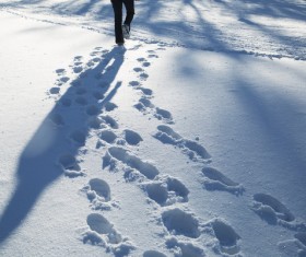 Snow footprints Stock Photo