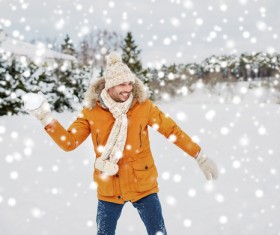 Snowball fight the man Stock Photo