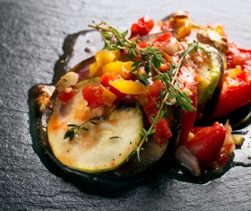 Steamed vegetables, baked eggplant and tomato stew spices