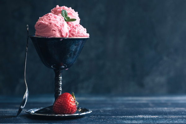 Strawberry in a goblet with ice cream Stock Photo