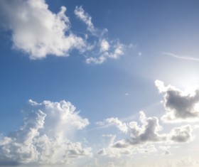 Sun and floating white clouds Stock Photo 01