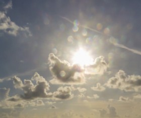 Sun and floating white clouds Stock Photo 02