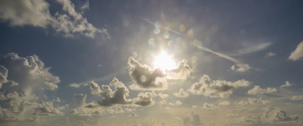 Sun and floating white clouds Stock Photo 02