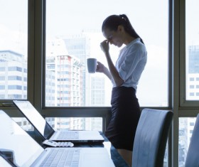 Take coffee cup massage eye female Stock Photo