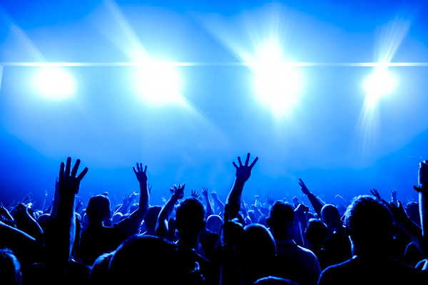The blue light shines on the cheering crowd rock concert 01 free download