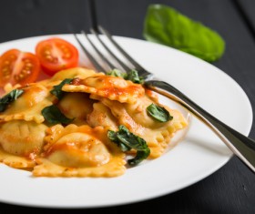 Tomatoes decorated with Italian dumplings HD picture