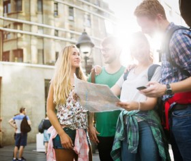 Tourists looking at the map of the city HD picture
