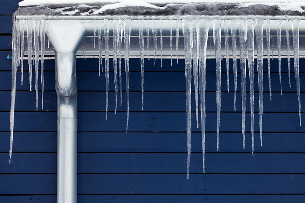 Under the eaves hanging icicles Stock Photo 04