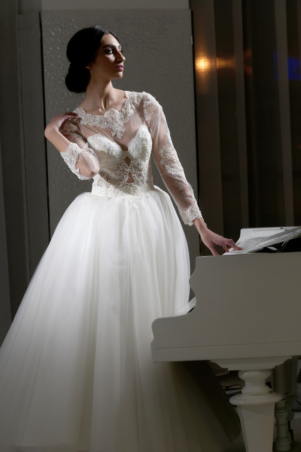 White wedding young bride with charming piano Stock Photo