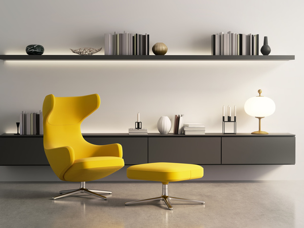 Yellow seat with bookcase background Stock Photo