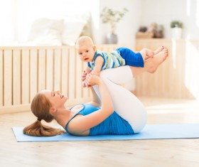Young woman doing yoga fitness and baby Stock Photo 03