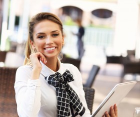 Young woman holding tablet HD picture