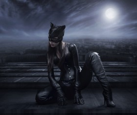 Amazing catwoman hunting at night Stock Photo