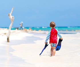 Beach boy with flippers Stock Photo 03