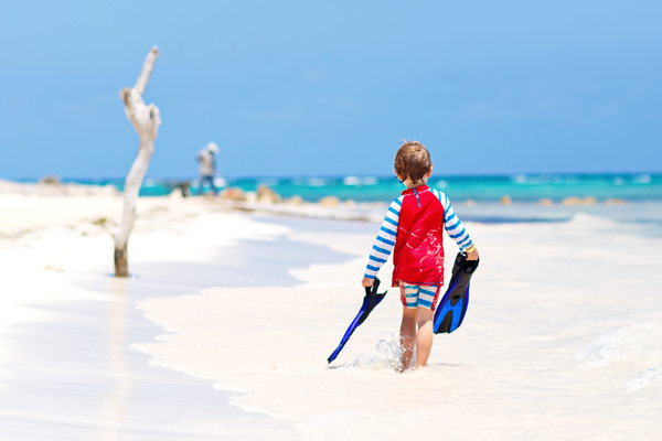 Beach boy with flippers Stock Photo 03