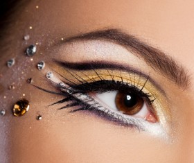 Beautiful woman with eyes, golden eye shadow Stock Photo 02