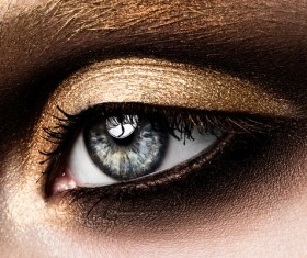 Beautiful woman with eyes, golden eye shadow Stock Photo 03