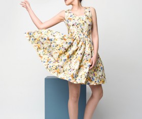 Beautiful young woman in nice dress Stock Photo