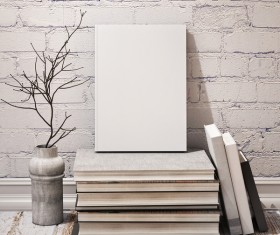 Book, vase and frame Stock Photo