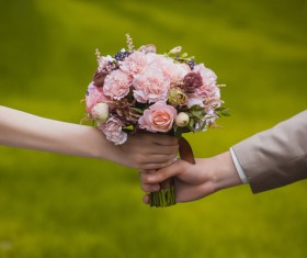 Bride and groom with bouquet Stock Photo