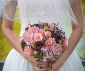 Bride holding bouquet Stock Photo