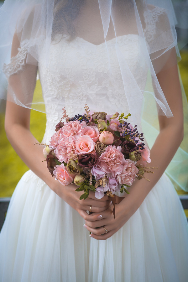 Bride holding bouquet Stock Photo
