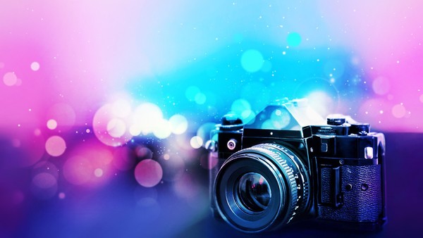 Camera with blurred background Stock Photo