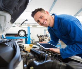 Car maintenance worker Stock Photo