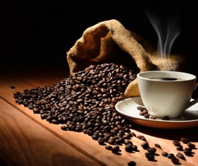 Coffee on the table with coffee beans Stock Photo