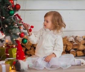 Cute little girl with christmas tree HD picture