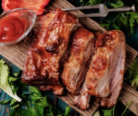 Delicious grilled pork ribs with vegetable sauce HD picture