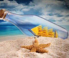 Drifting bottles on the beach Stock Photo