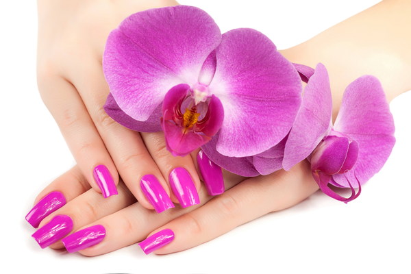 Fashion nail and orchids Stock Photo