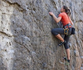 Female rock climber Stock Photo