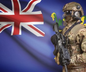 Flag of Fiji with heavily armed soldiers Stock Photo