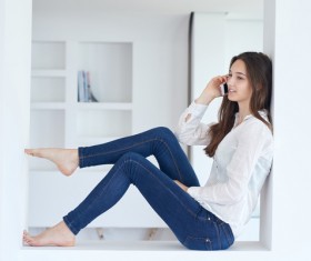 Girl talking with a smartphone HD picture