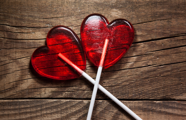 Heart-shaped lollipop Stock Photo
