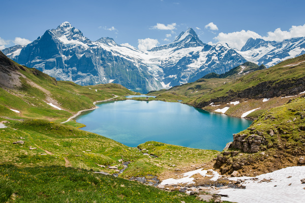 Lakes with snow-covered mountains Stock Photo