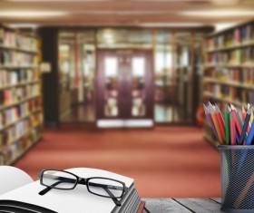 Library with desk pencil case with glasses Stock Photo 01