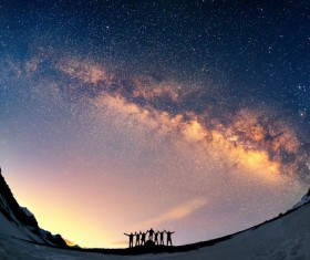 People looking up in the night sky Stock Photo